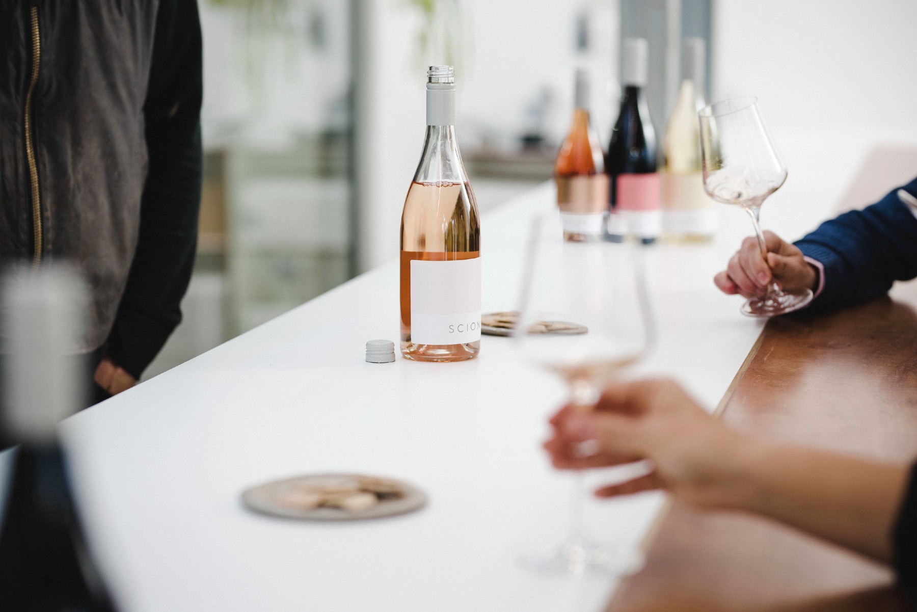 Wine bar with people doing wine tasting. 